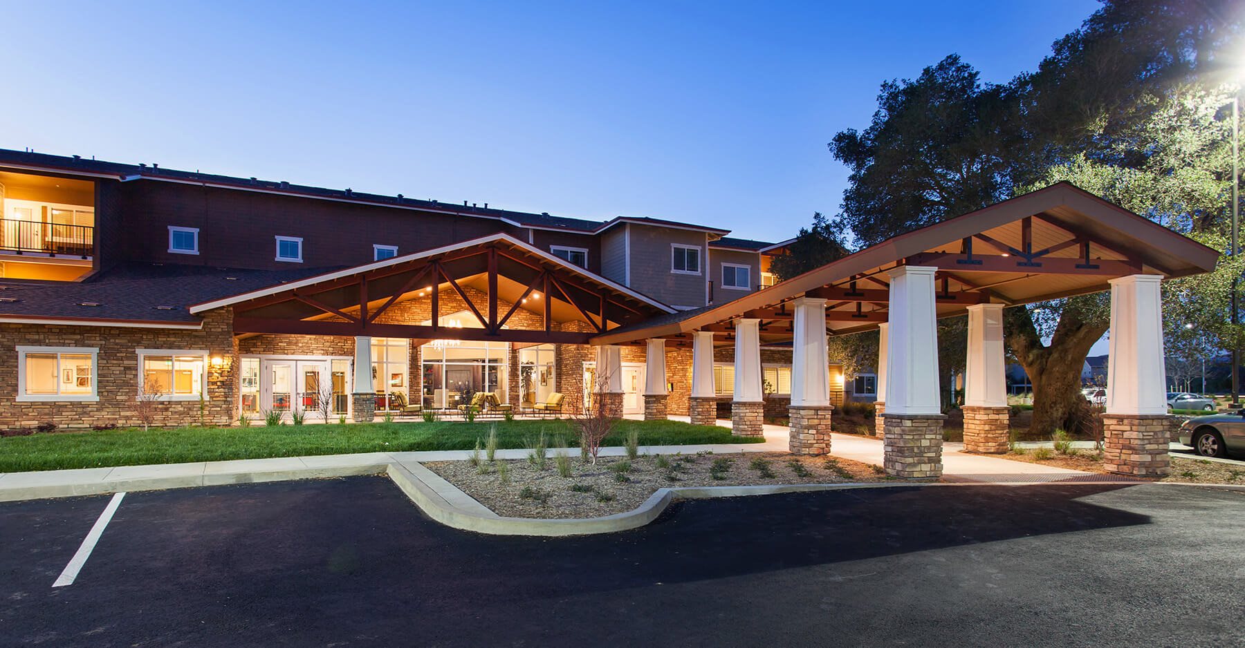 Exterior Entrance at Dusk at The Lodge at Morgan Hills Apartments in Morgan Hill CA